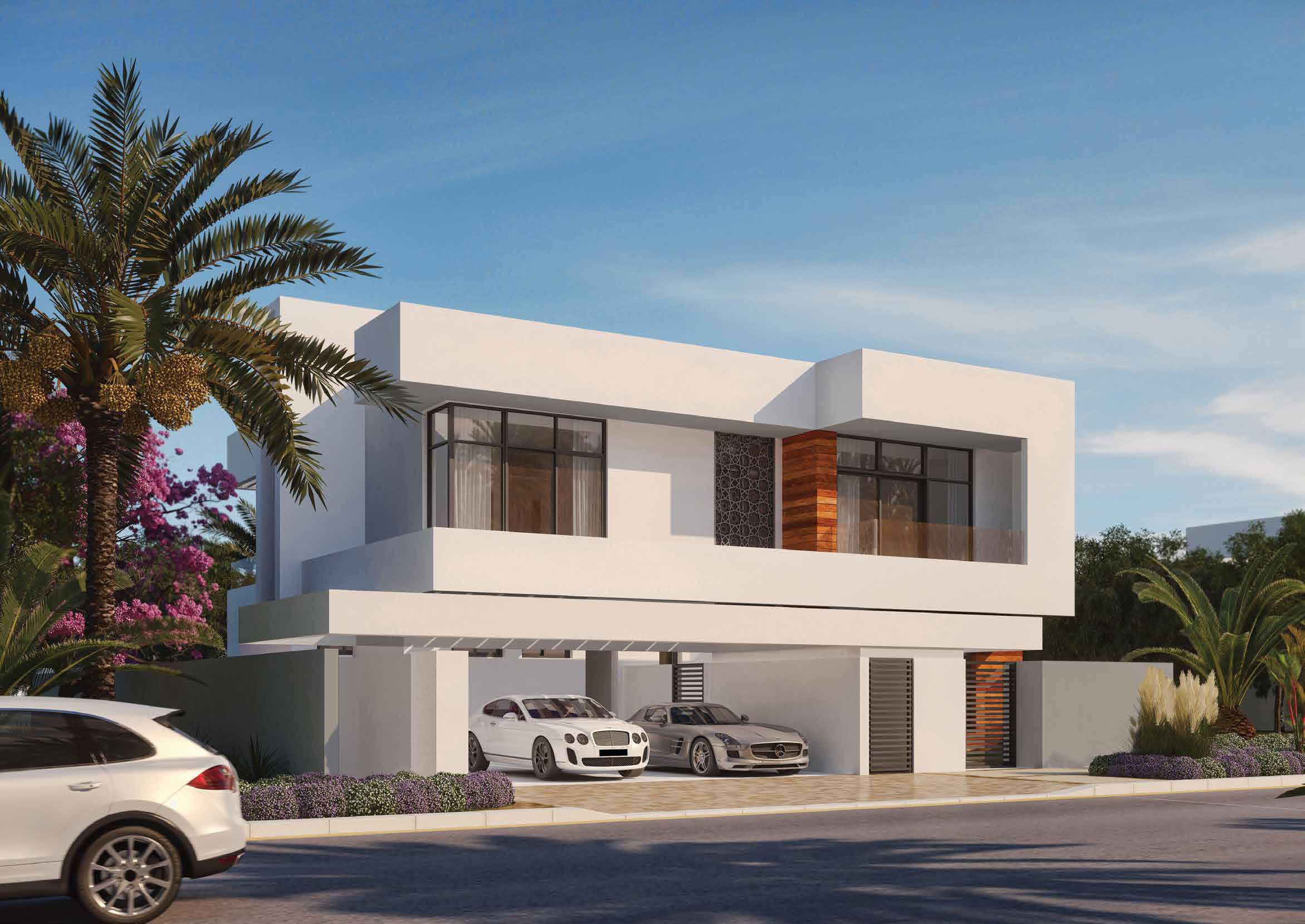 Night view of West Yas villas, Yas Island, Abu Dhabi illuminated with warm exterior lighting