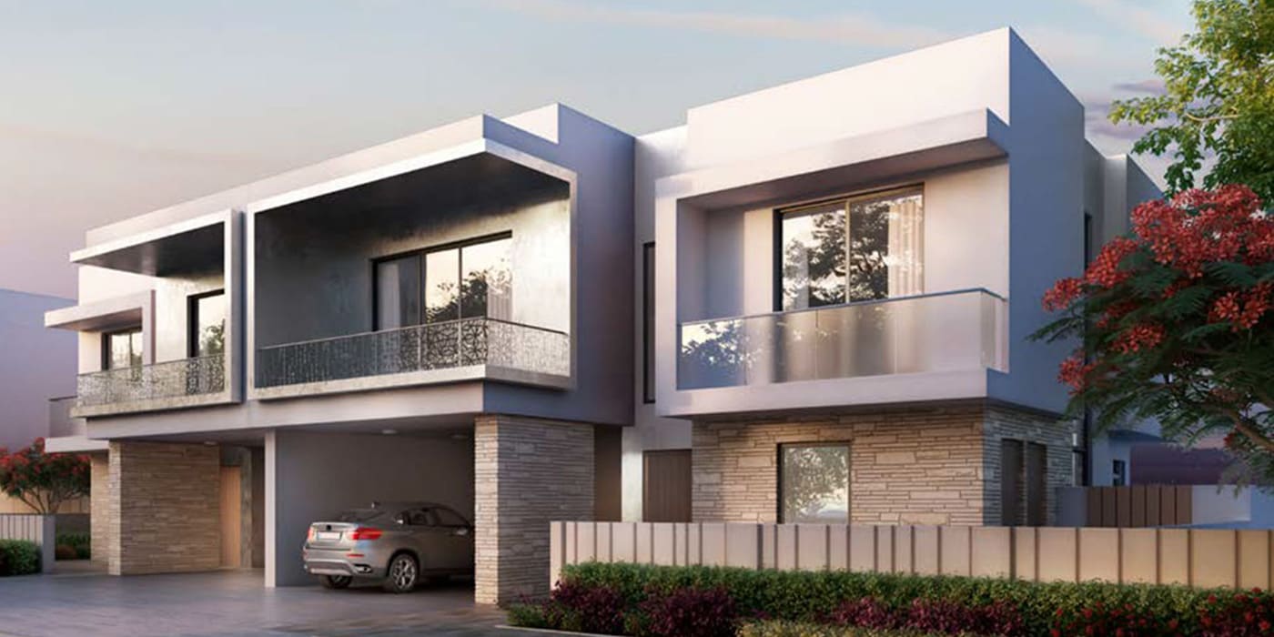 Exterior view of a Cedars villa facade framed by Yas Acres greenery.