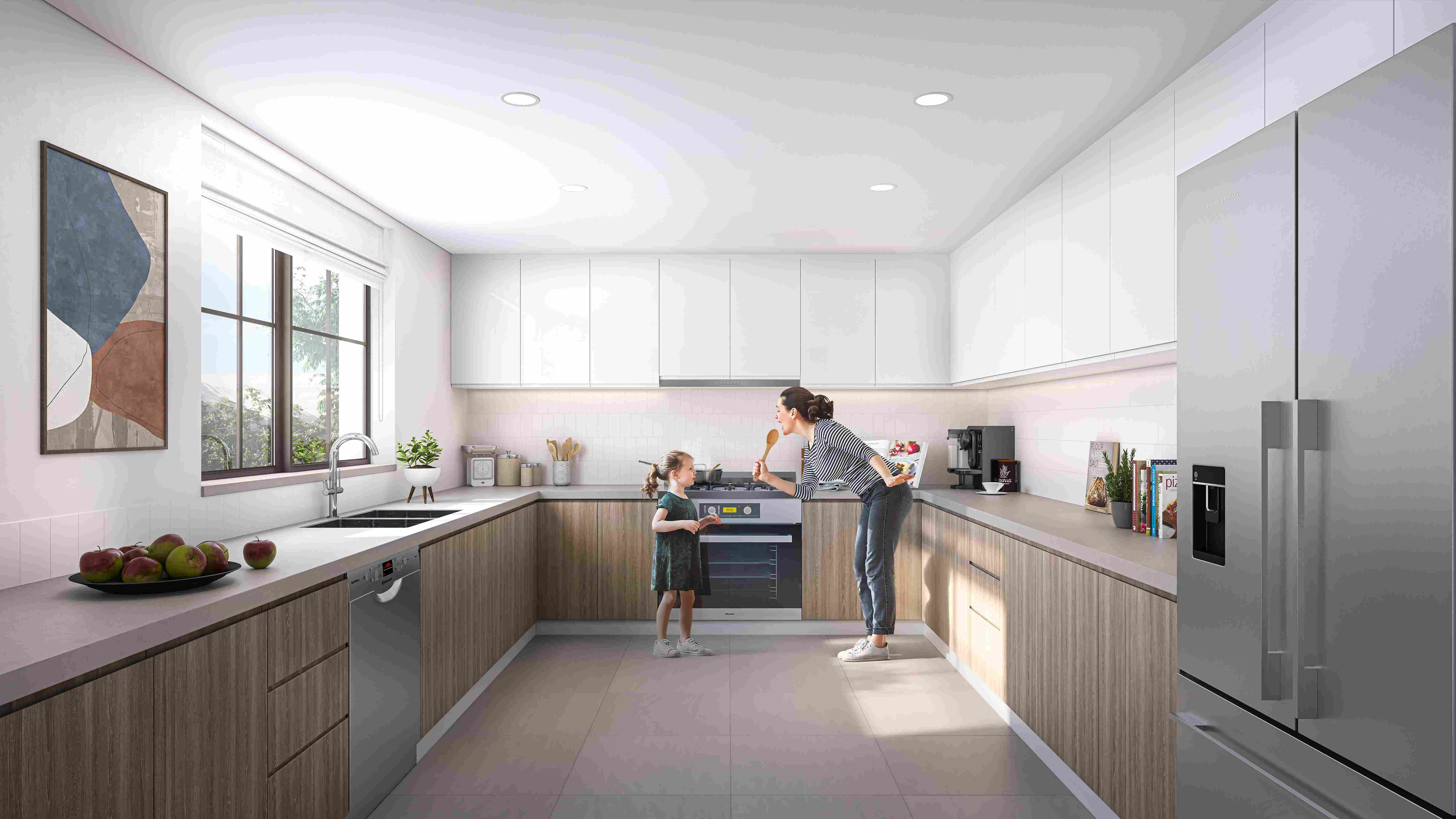 Open dining area filled with natural light and connected to the garden in Yas Park Views, enhancing indoor-outdoor living on Yas Island.