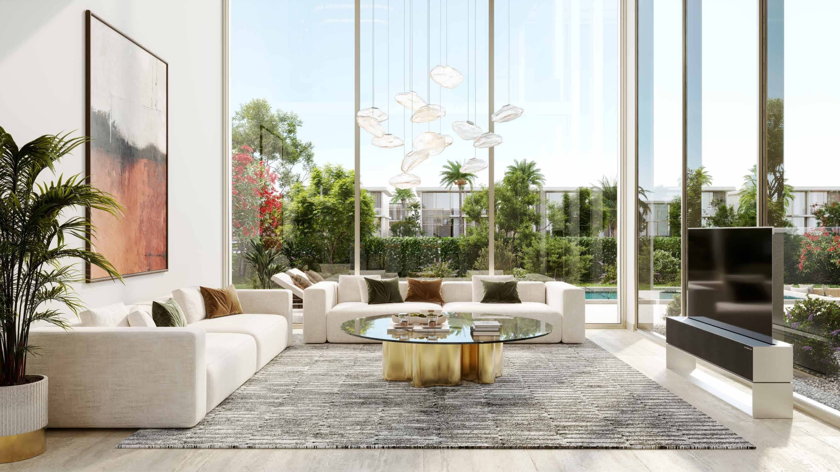 Bright open-plan living space at Manchester City Yas Residences on Yas Island, Abu Dhabi with sophisticated modern interiors.